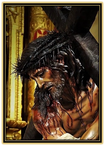 Jesús con la cruz acuestas