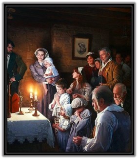 Familia rezando el Rosario